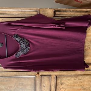 Like new embellished top
